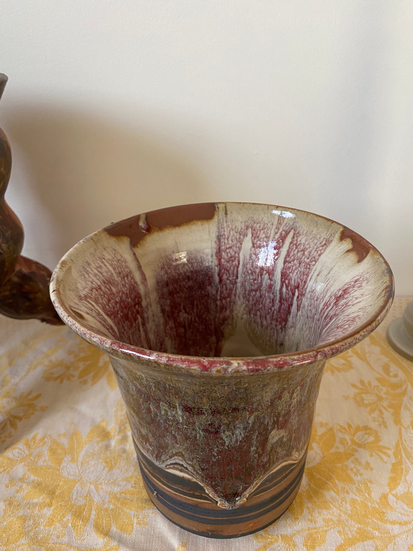 Striped vase w/ red drips