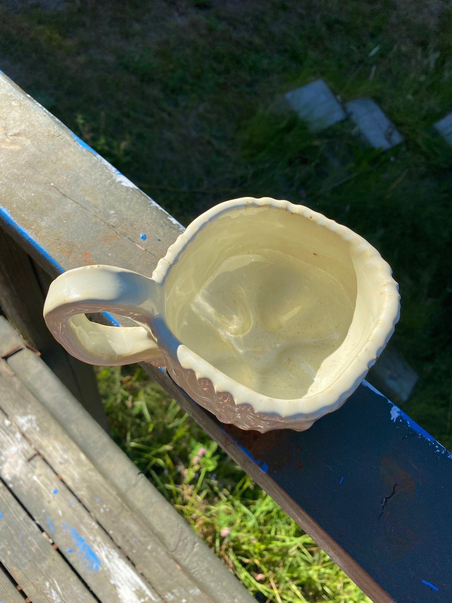 Cream colored mug with squared shape