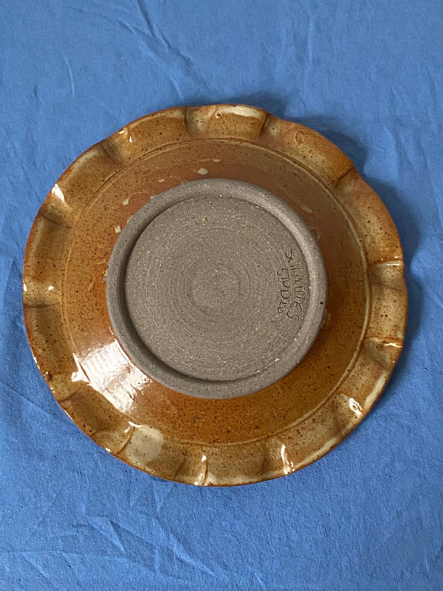 Rust plate with ruffled edge