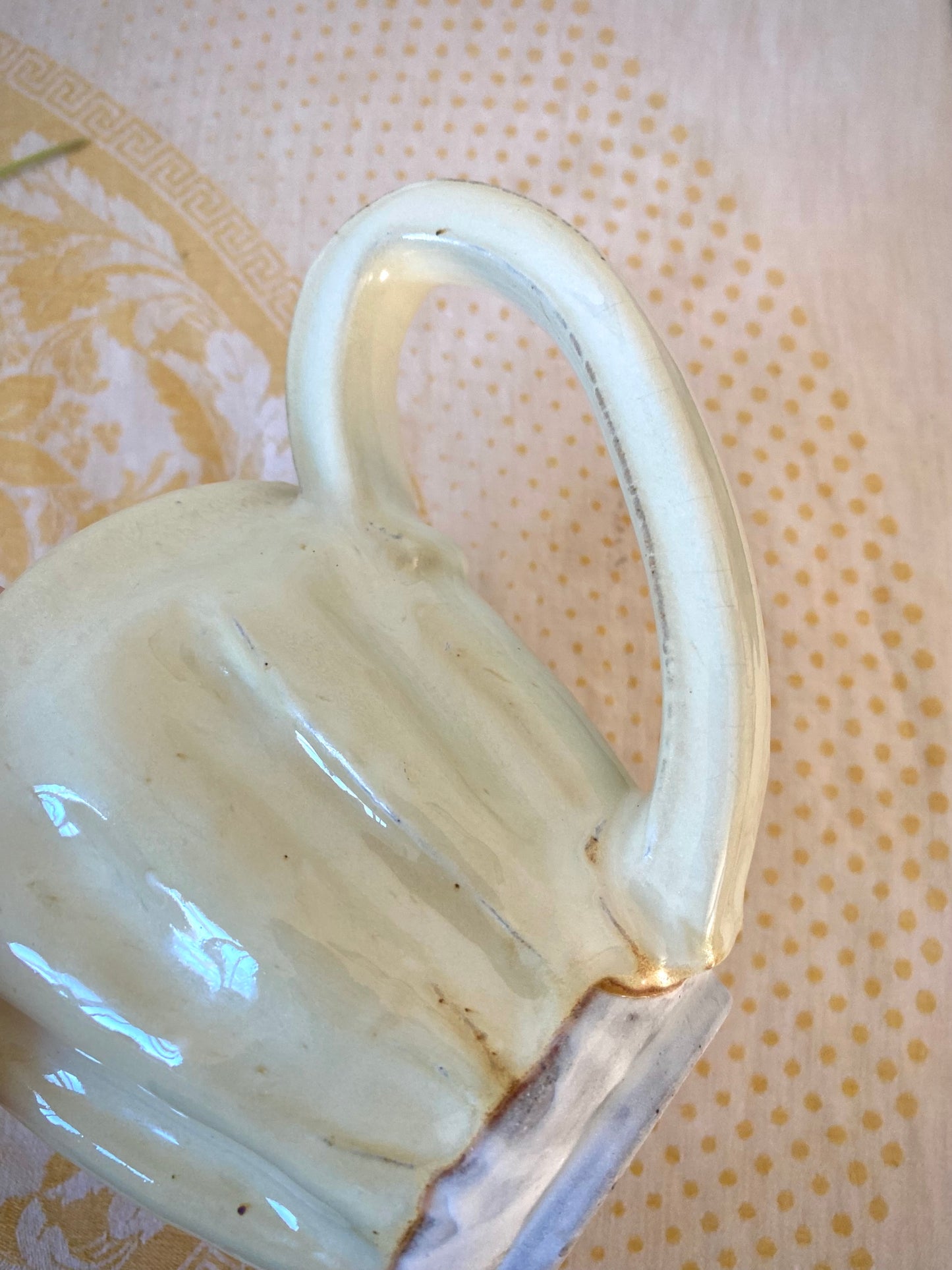 Cream colored mug with big ol’ handle