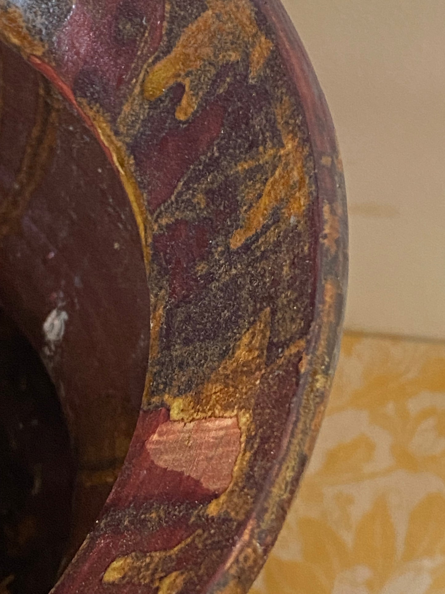 Tripod reddish pot