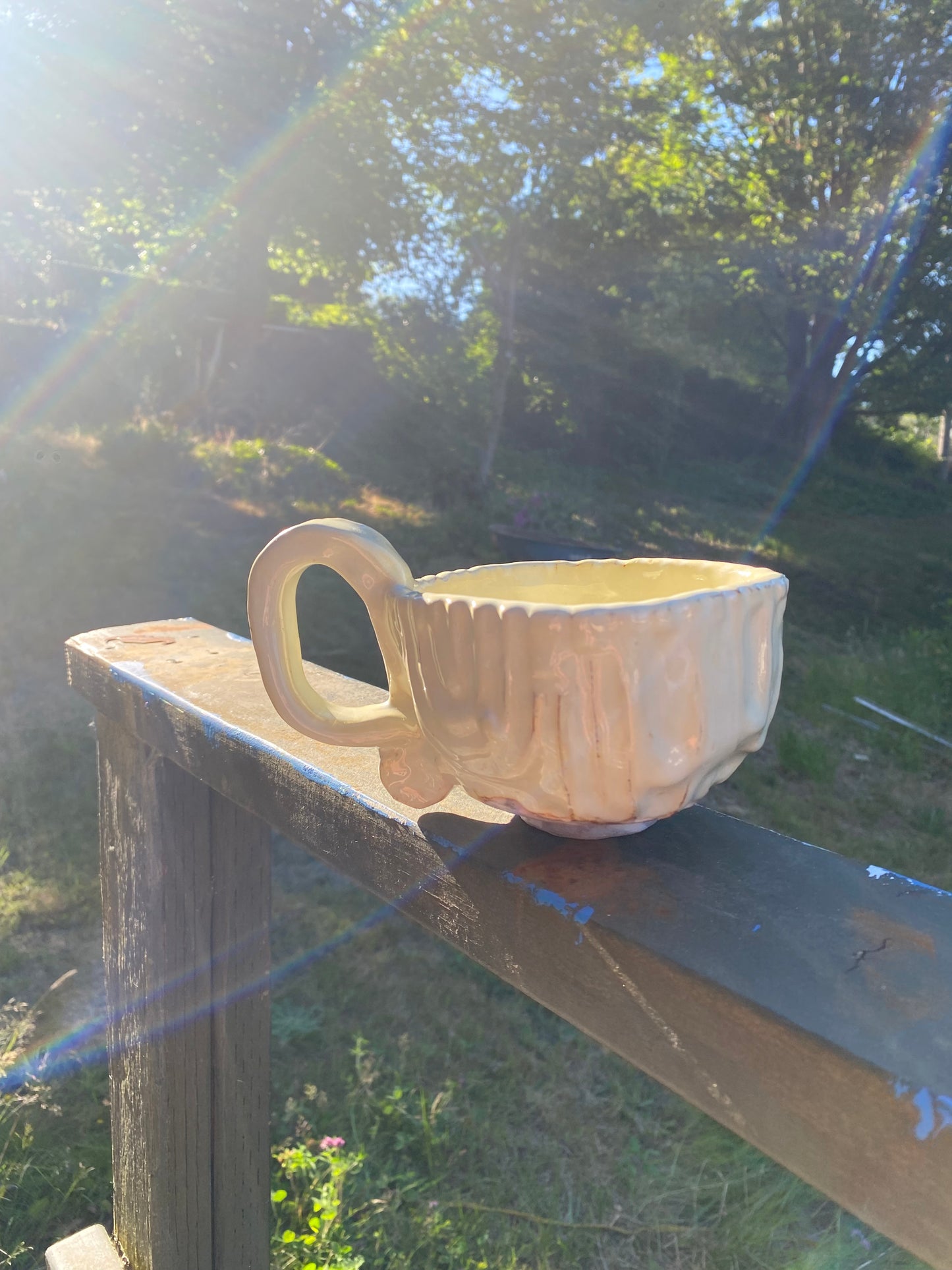 Cream colored mug with squared shape