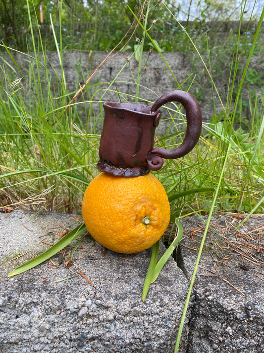 Terracotta espresso cup with swirly handle