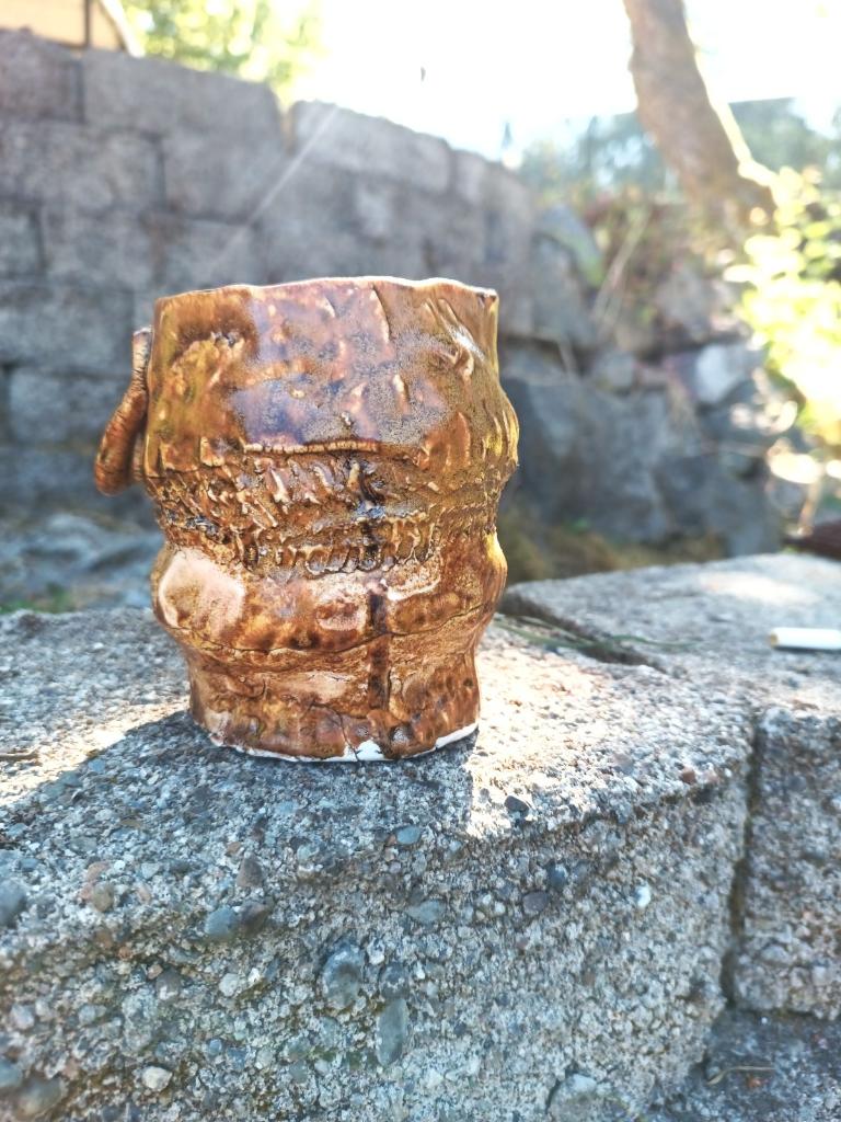 Handbuilt amber porcelain tumbler