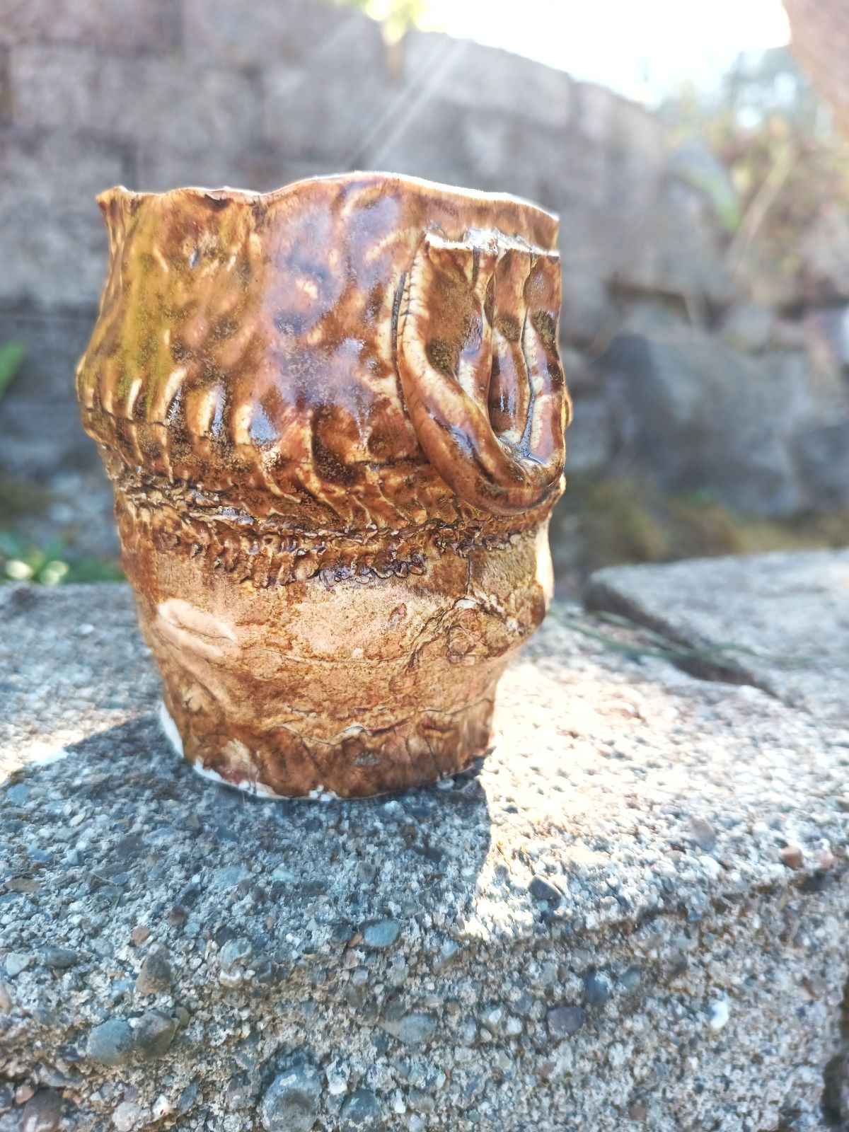 Handbuilt amber porcelain tumbler