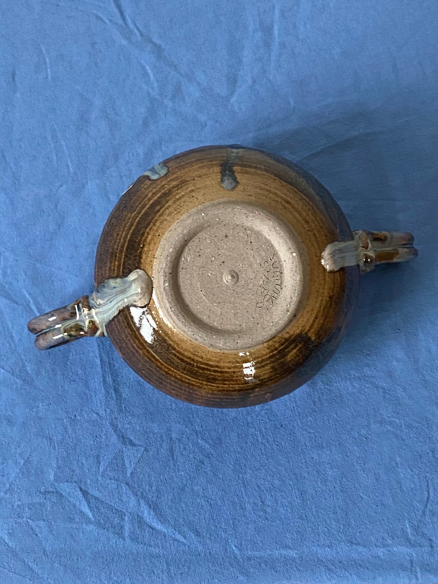 Black two handled bowl violet drips