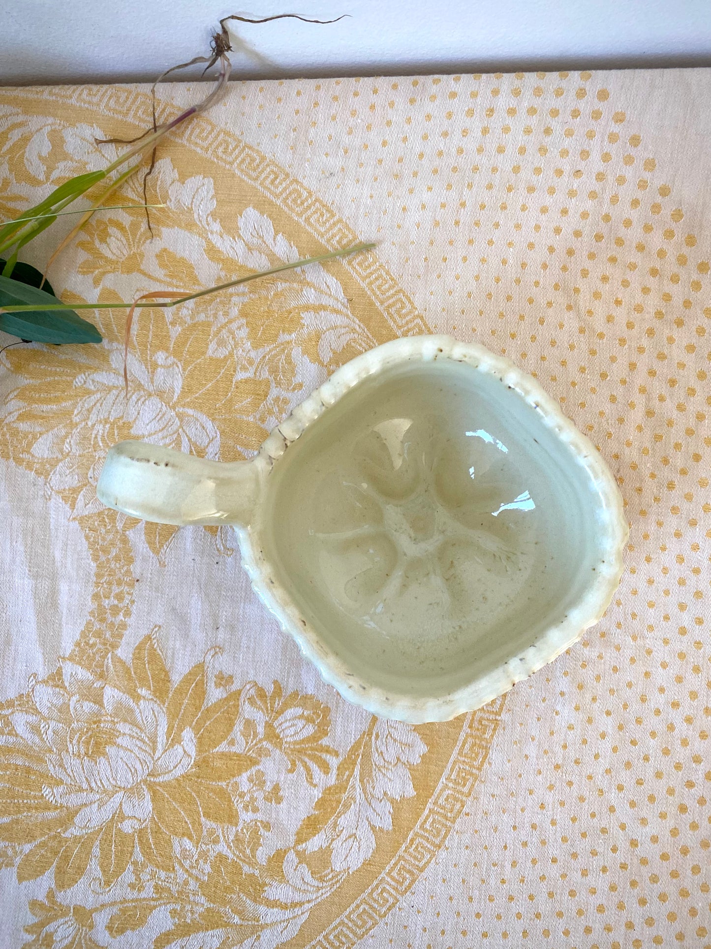 Cream colored mug with squared shape