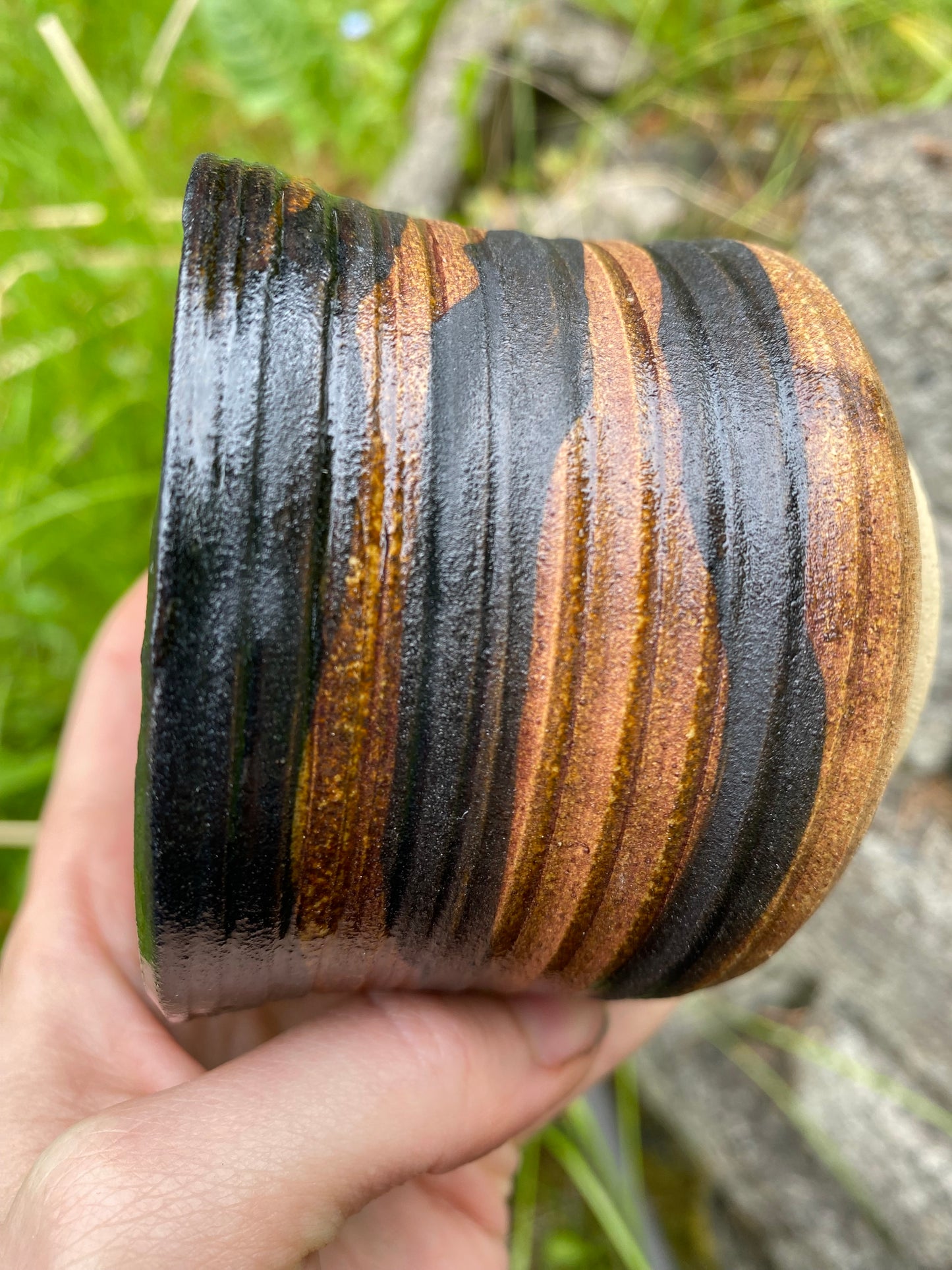 Small cup with horizontal bands