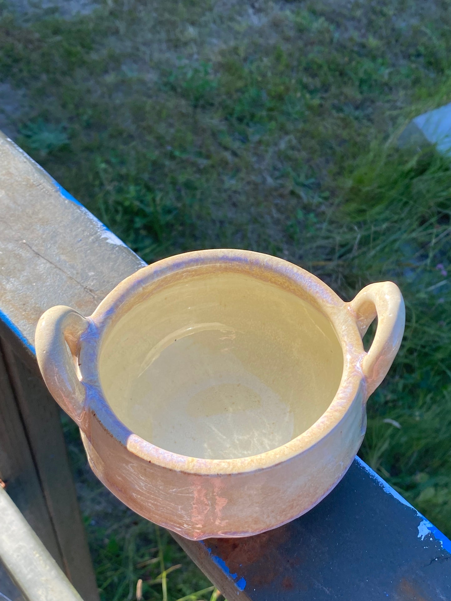 Small cream colored bowl with violet drips