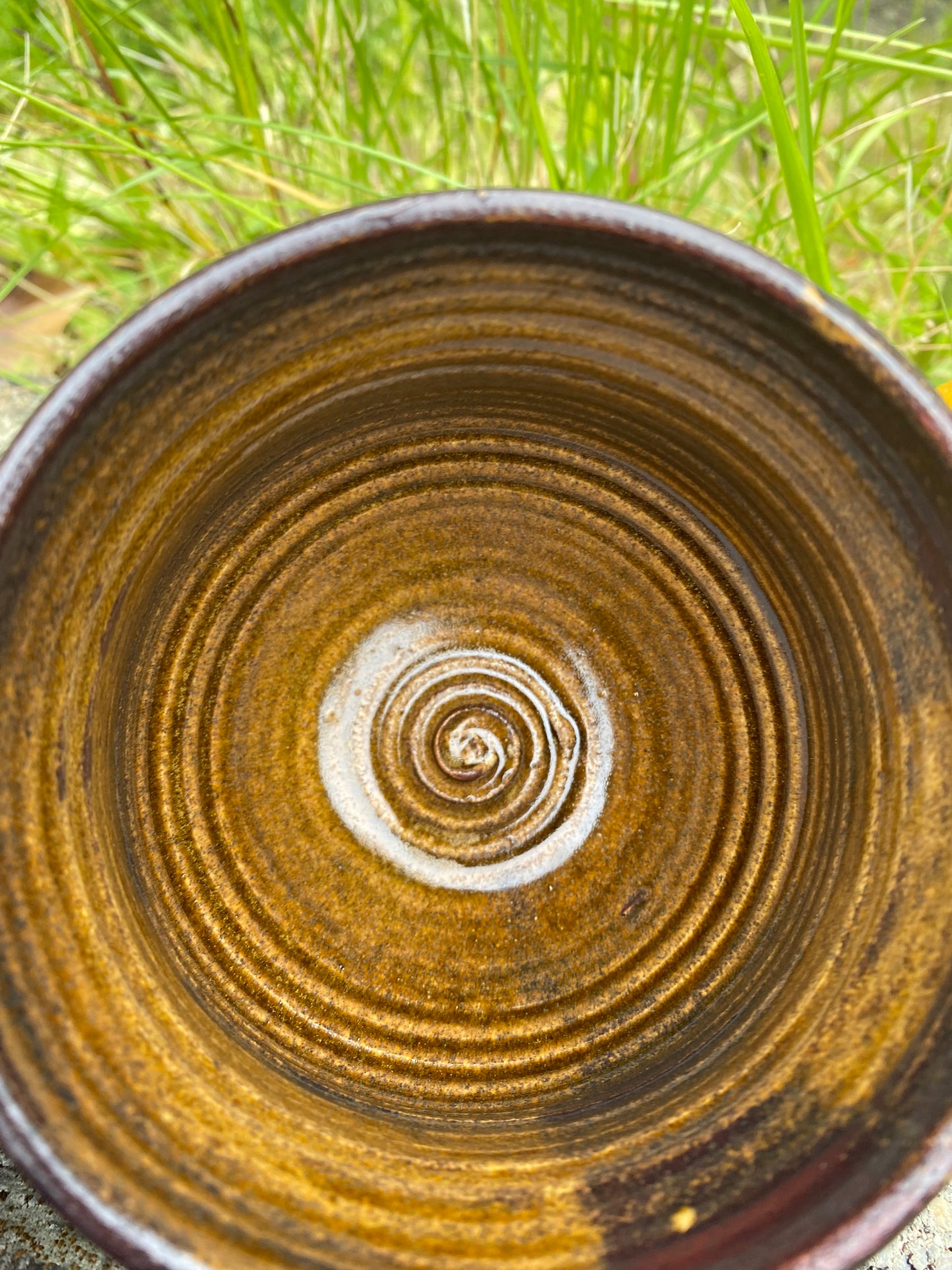 Terracotta espresso cup with swirly handle