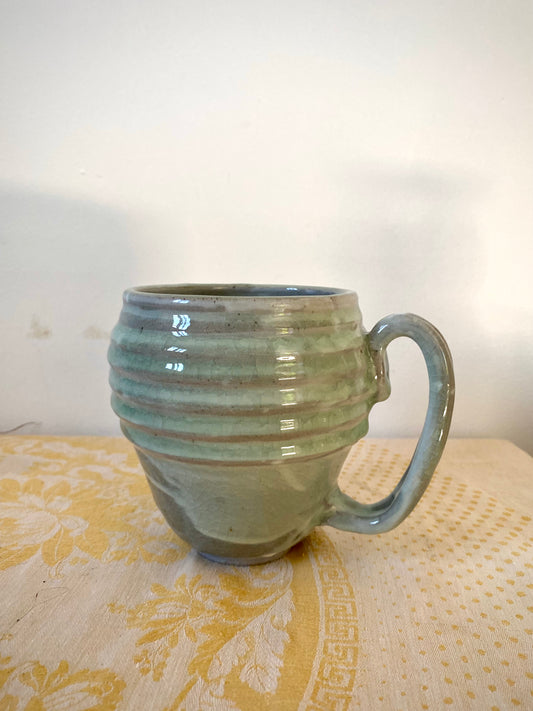 Light green mug with horizontal bands