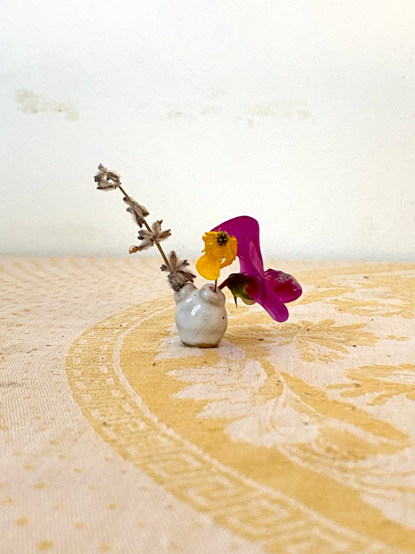 Very small vase with three apertures