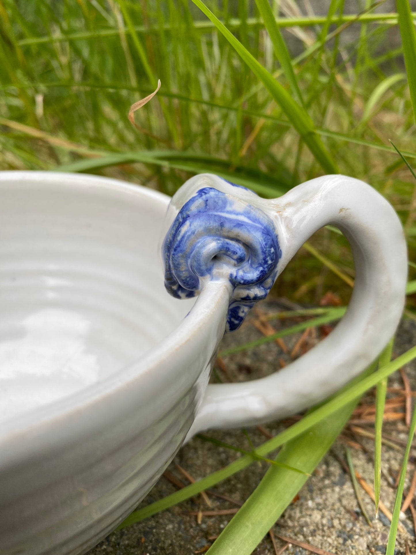 Cappuccino cup with blue swirl