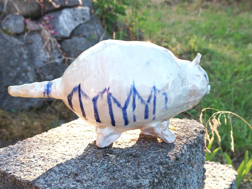 Beast piggy bank with blue fence