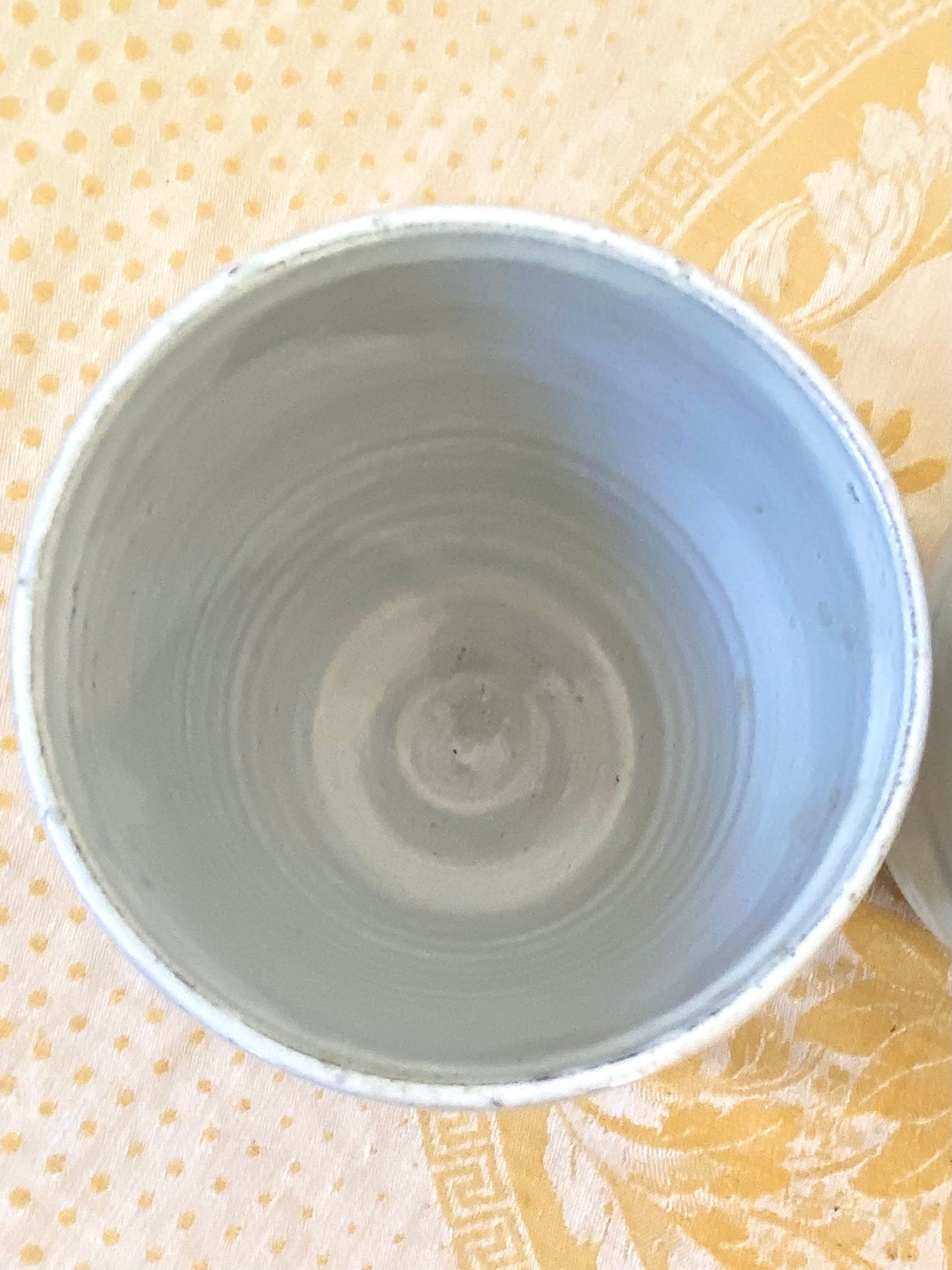 Set of terracotta and white vessels