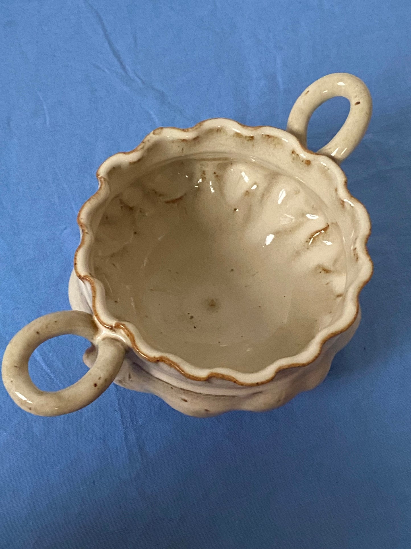 Cream personal soup with ruffles