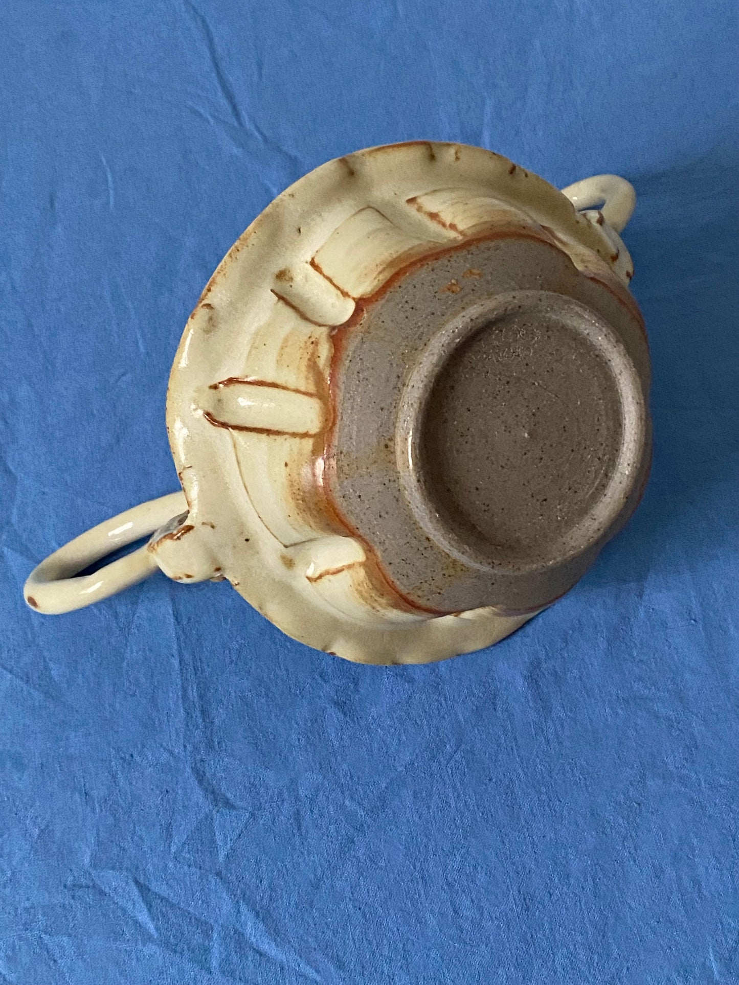 Cream bowl with stirrup handles