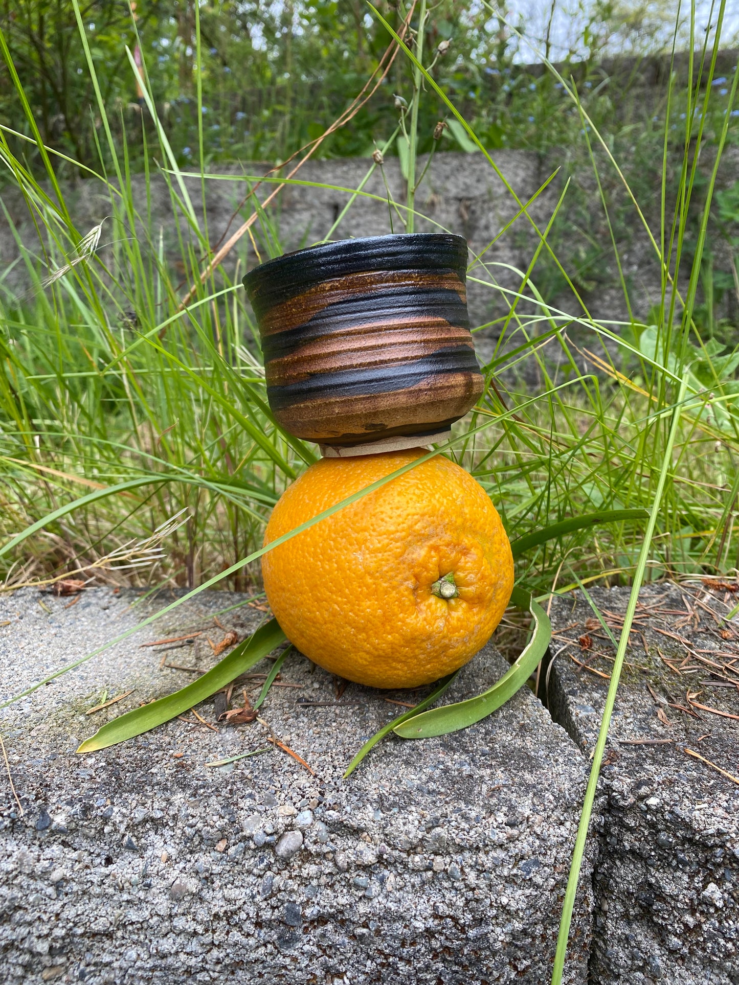 Small cup with horizontal bands