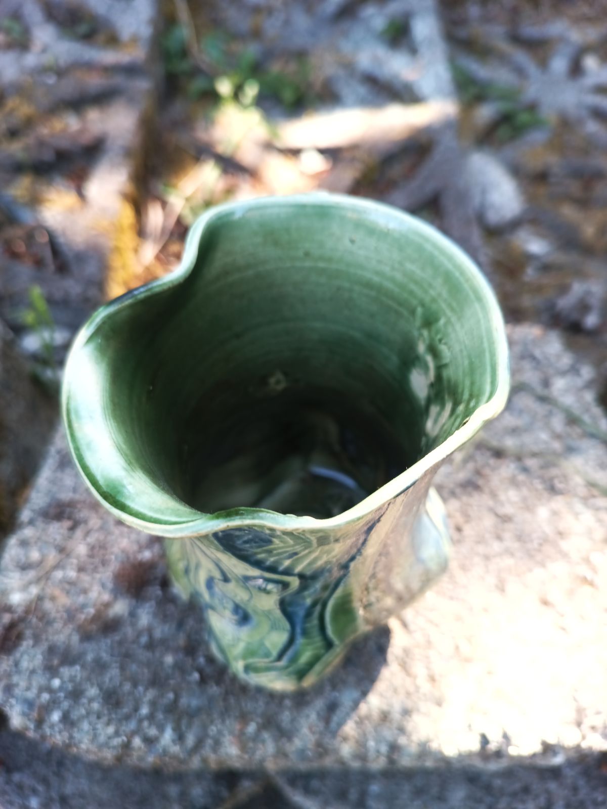 Green vase with blue carving