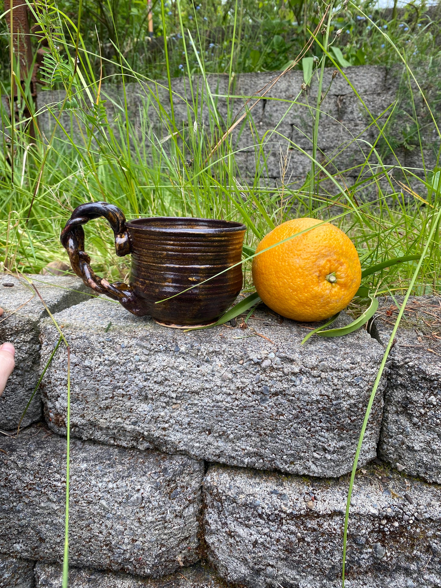 Terracotta espresso cup with swirly handle