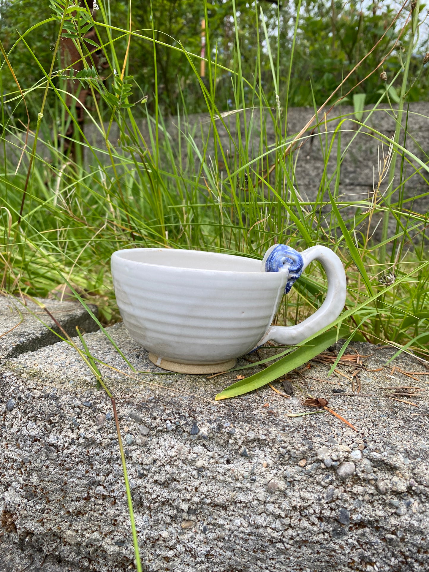 Cappuccino cup with blue swirl