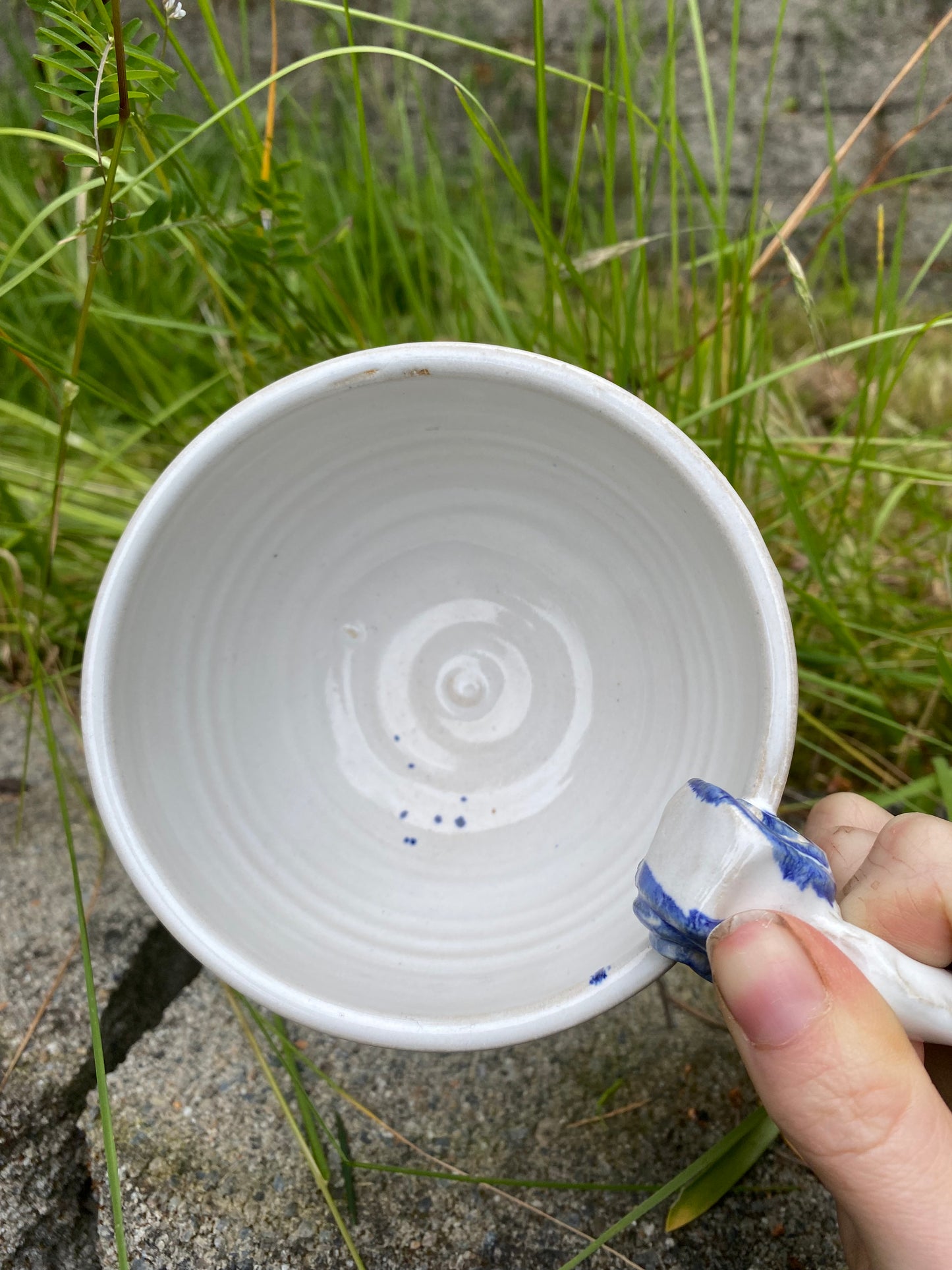 Cappuccino cup with blue swirl