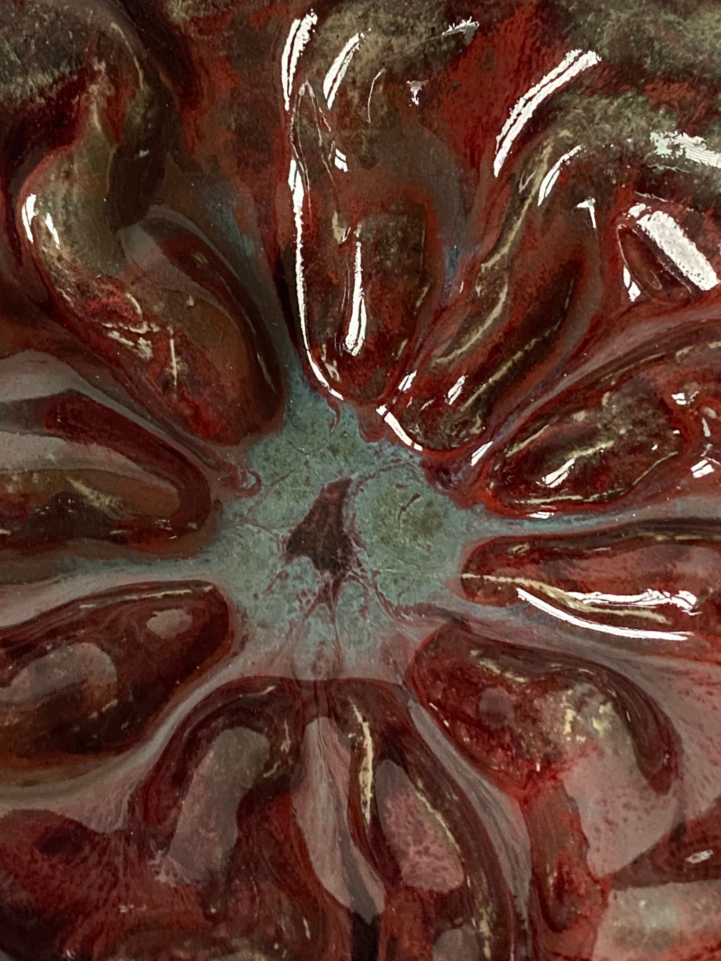 Ruffled bowl with red interior