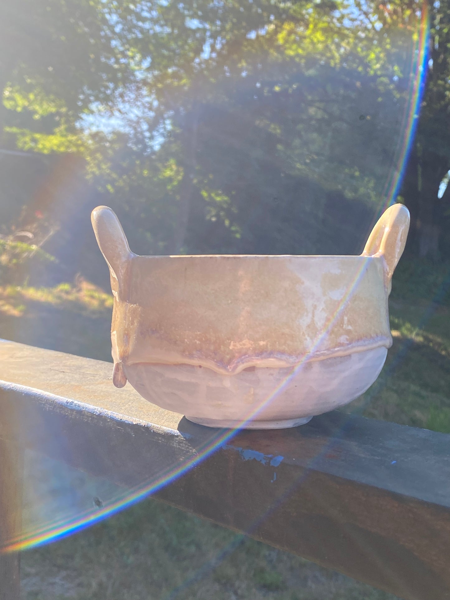 Small cream colored bowl with violet drips