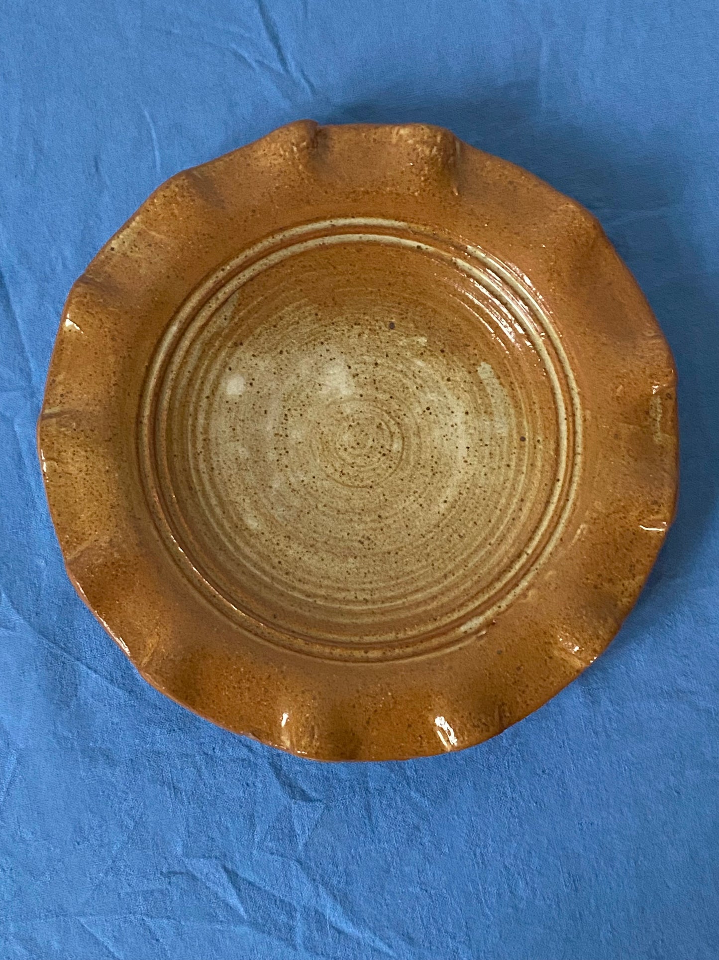 Rust plate with ruffled edge