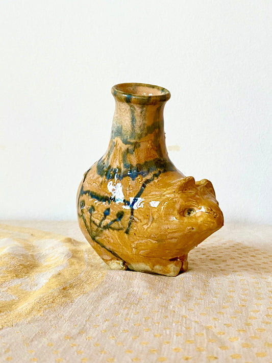 Yellow Pygmy rabbit with tippy pot
