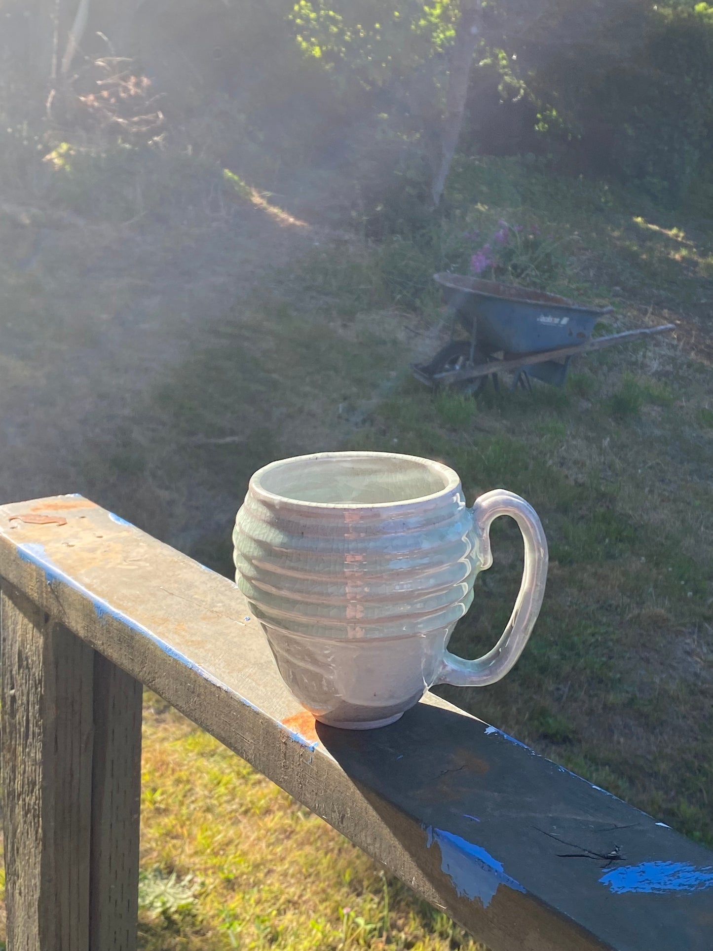Light green mug with horizontal bands