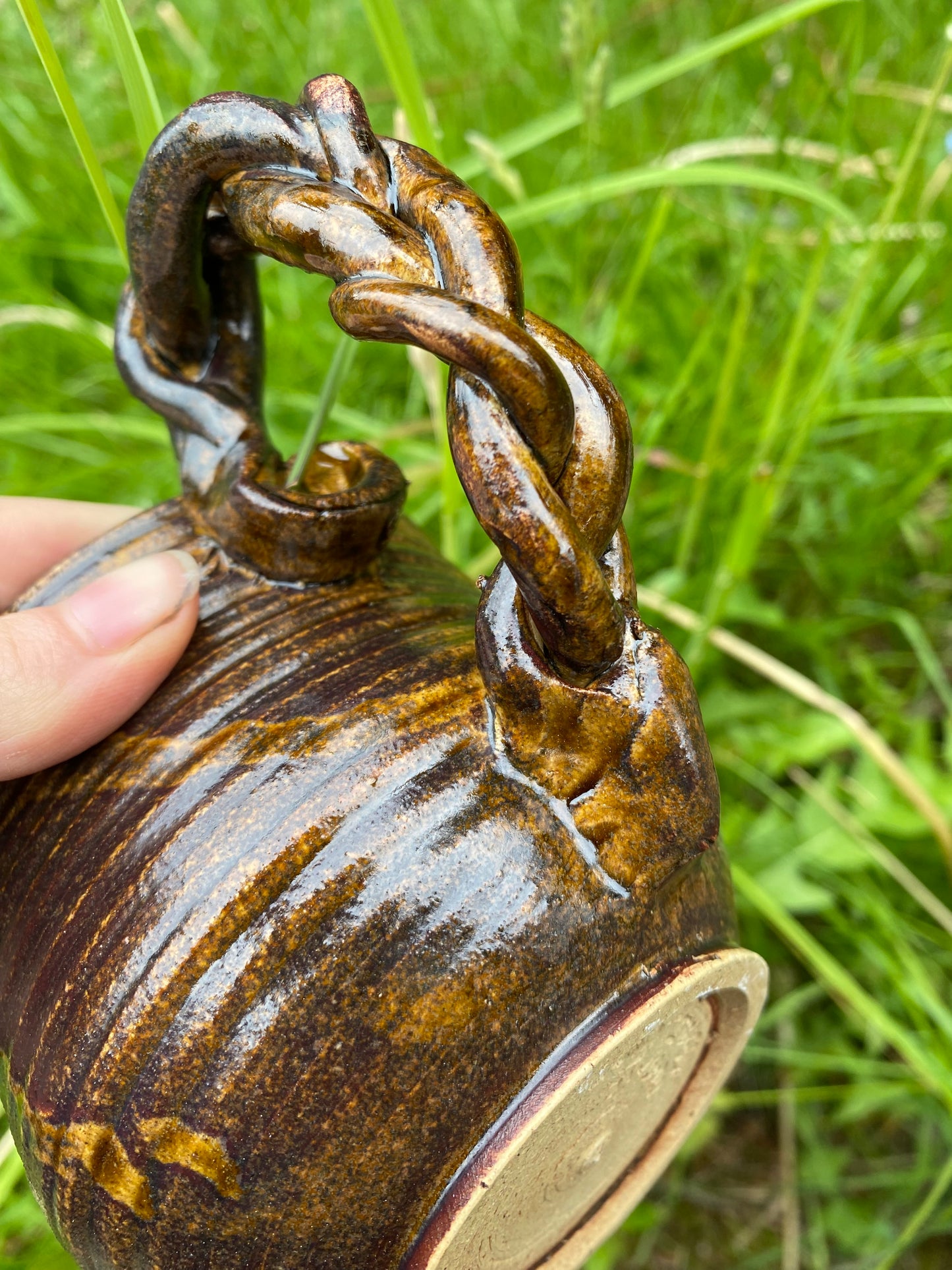 Terracotta espresso cup with swirly handle