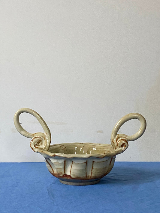 Cream bowl with stirrup handles