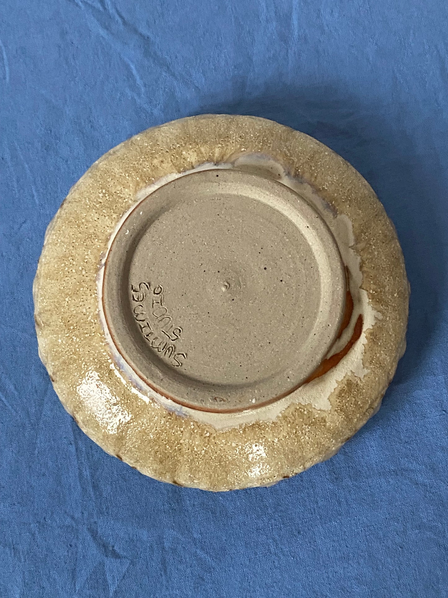 Shallow bowl with hollow wall, green interior