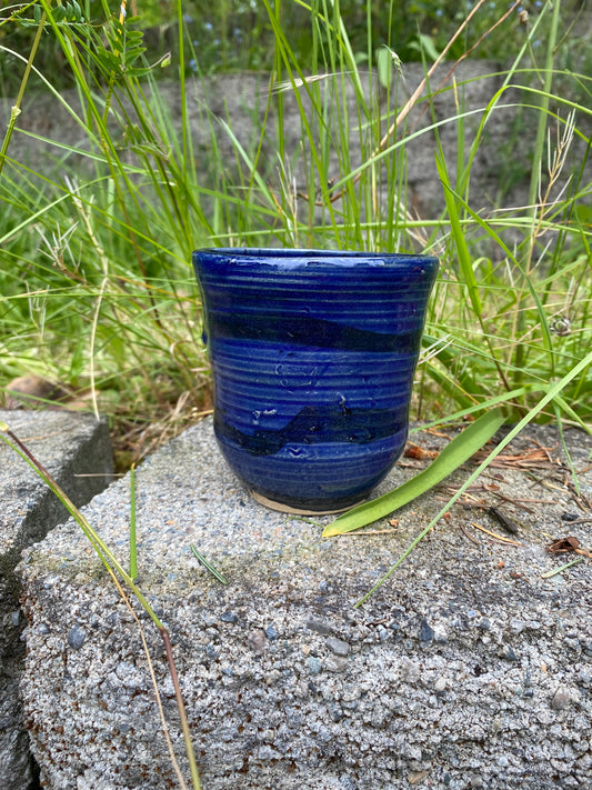 Blue tumbler with horizontal stripe