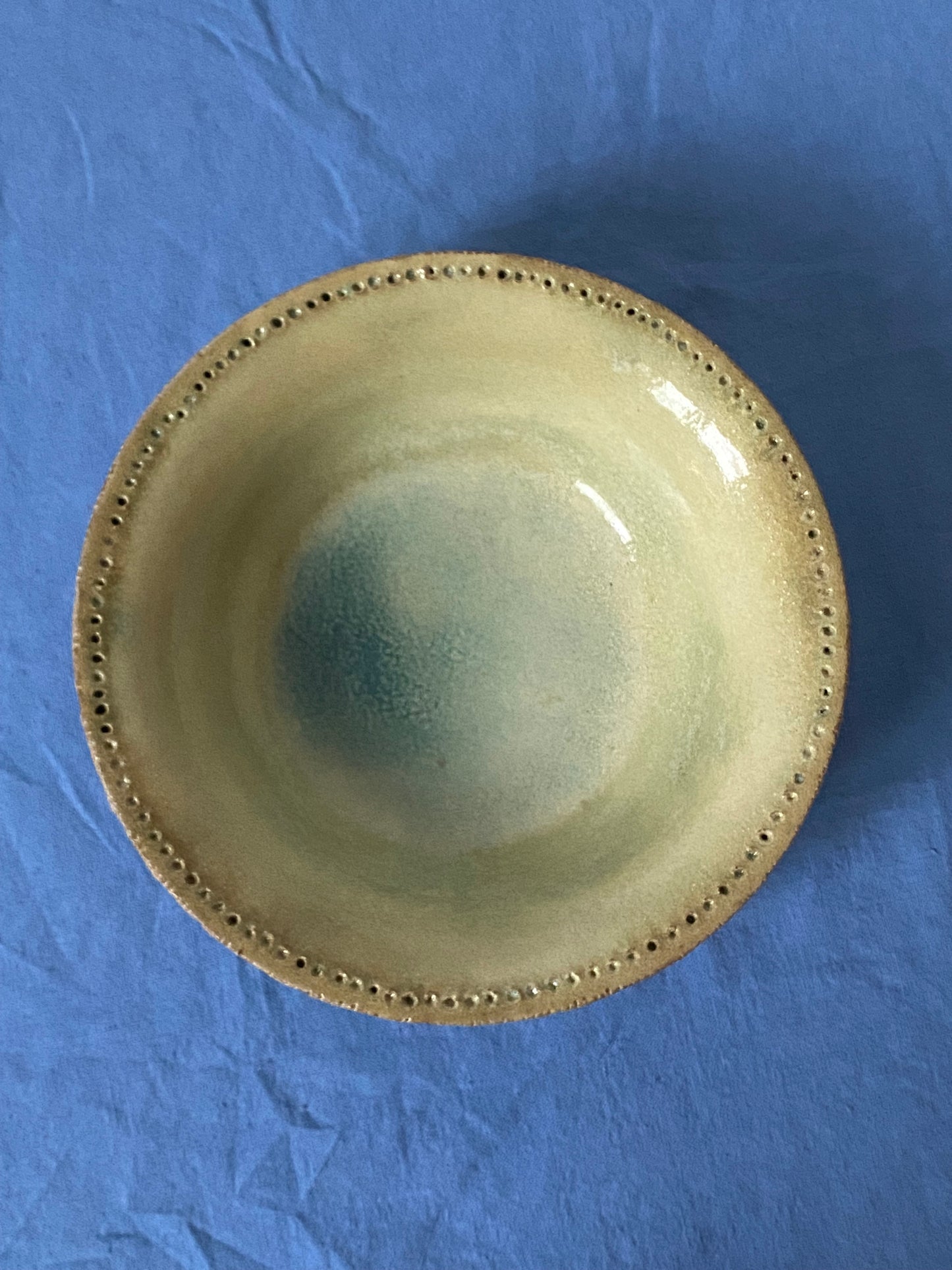 Shallow bowl with hollow wall, green interior