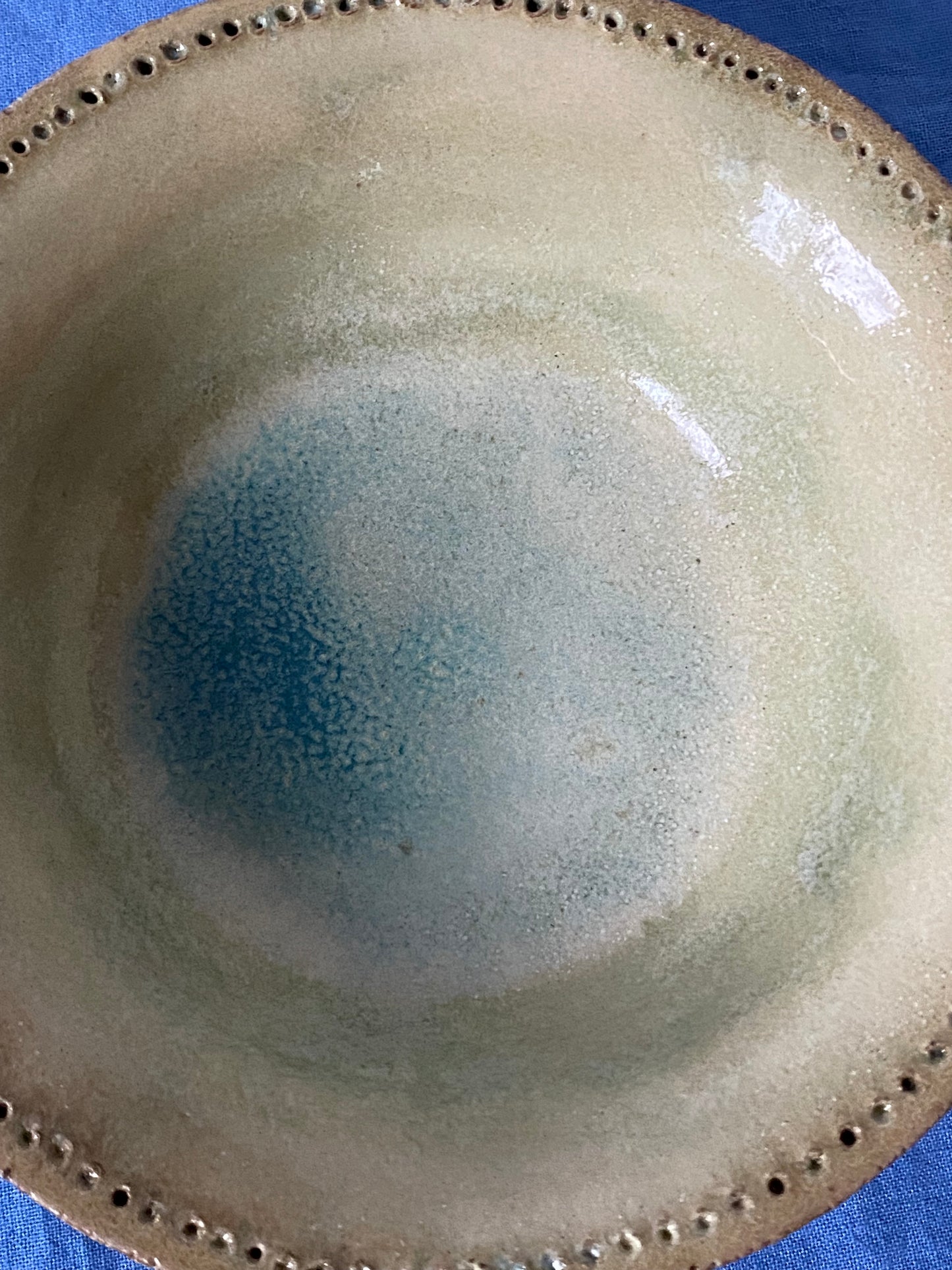 Shallow bowl with hollow wall, green interior