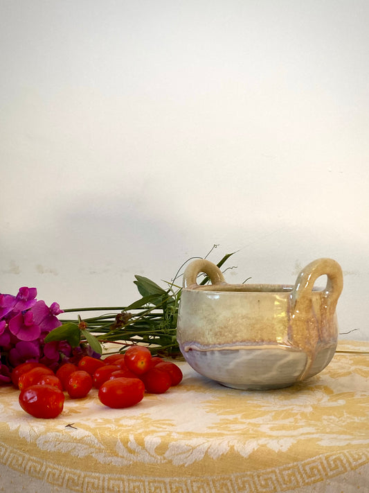 Small cream colored bowl with violet drips