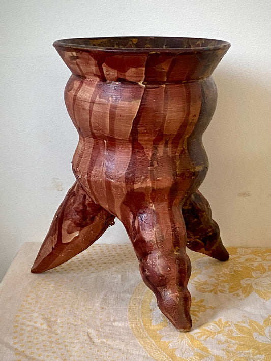 Tripod reddish pot