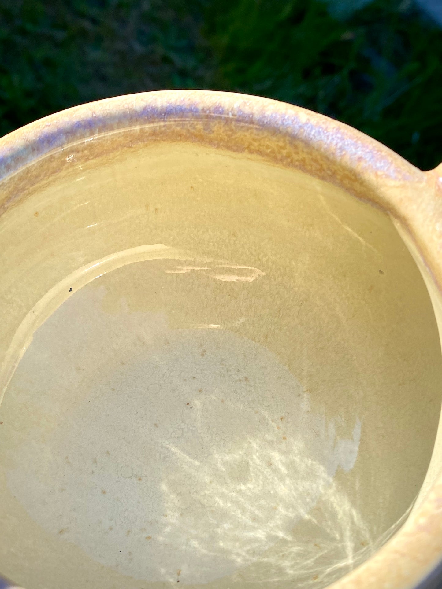 Small cream colored bowl with violet drips