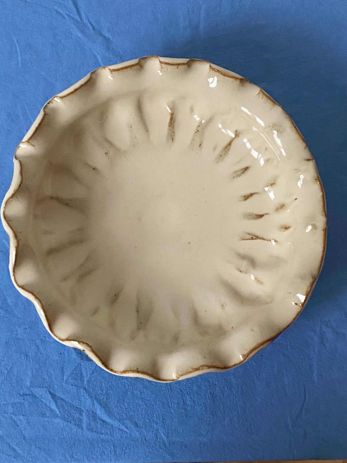 Yellow cream plate with ruffled edge