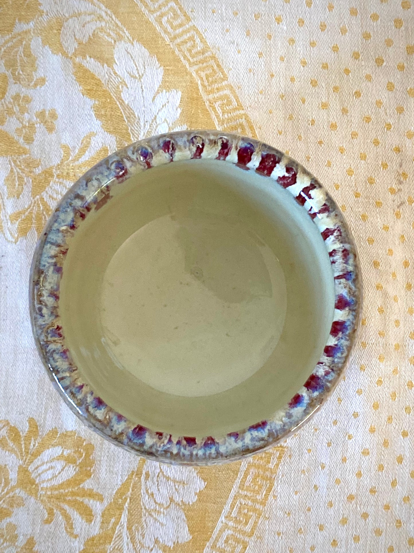 Tumbler with red vertical stripes on inside