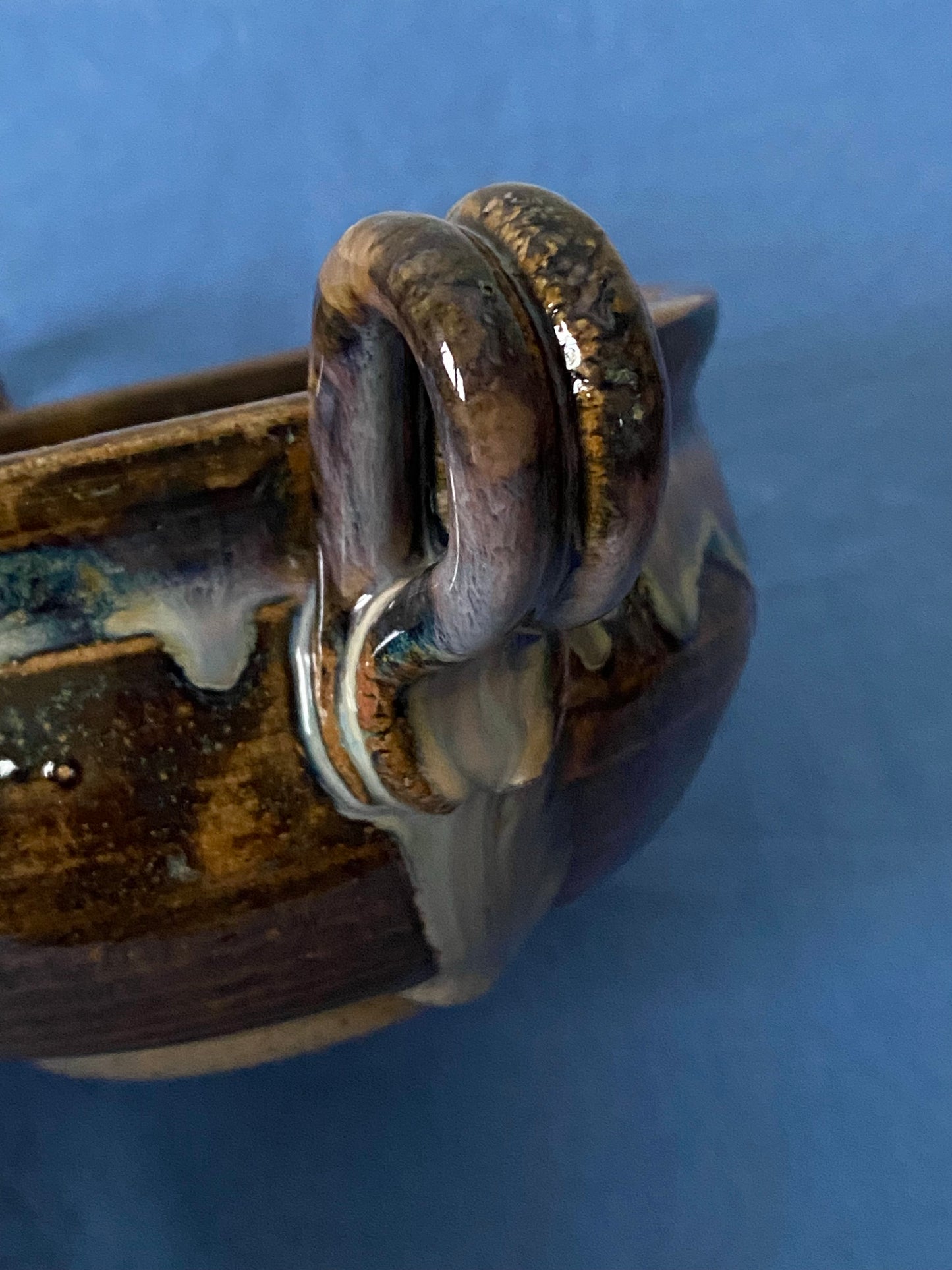 Black two handled bowl violet drips