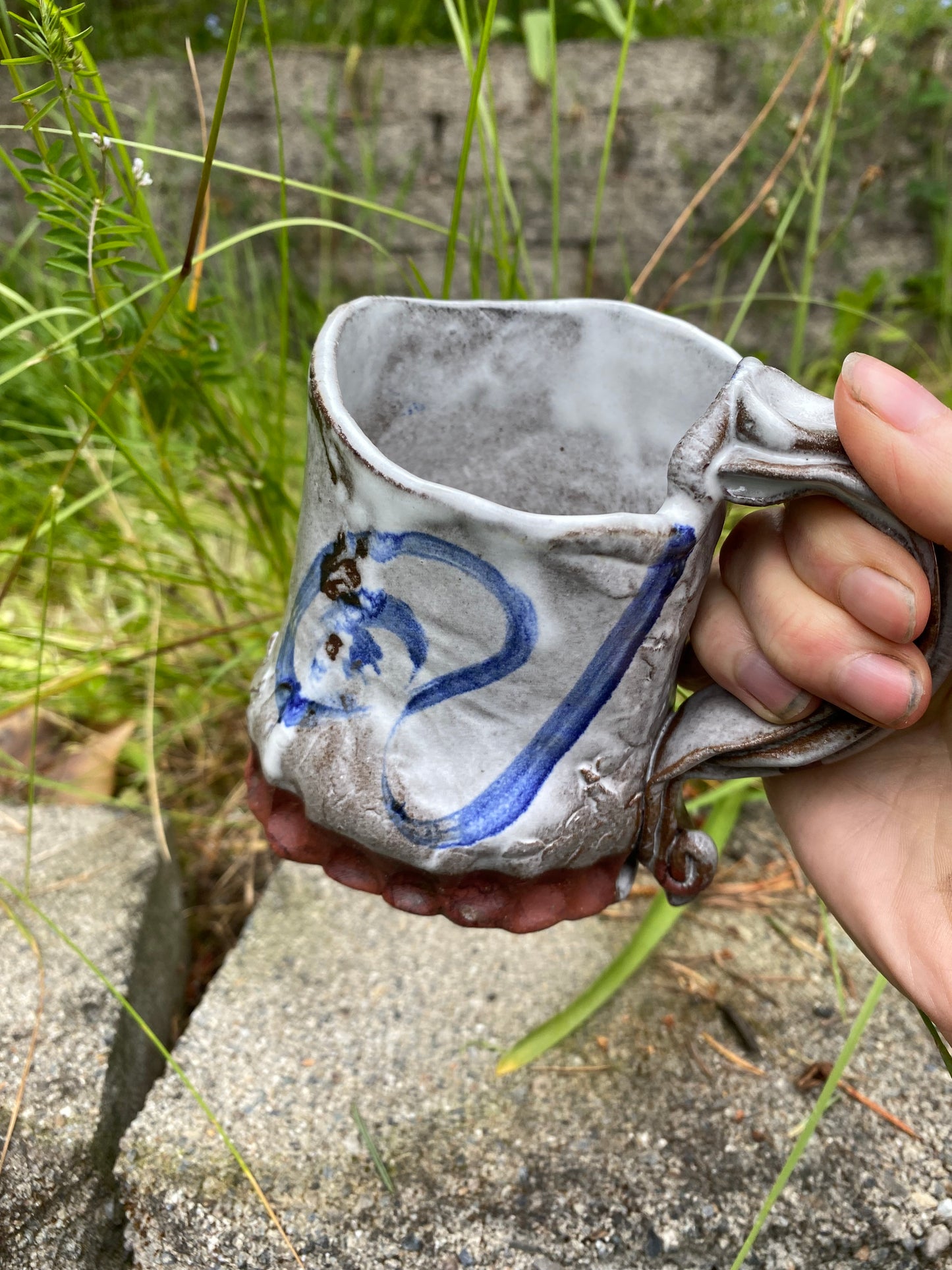 Hand built cup with 3 lines