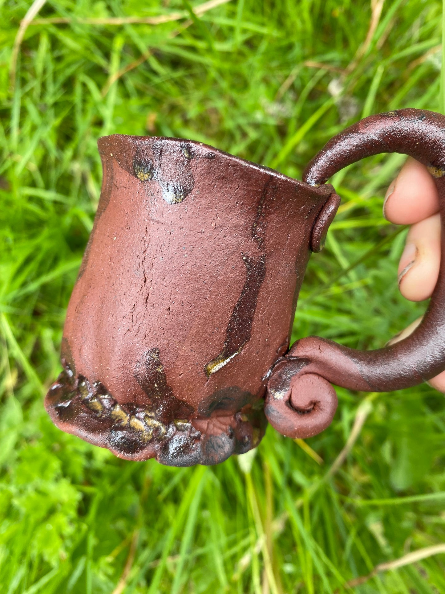 Terracotta espresso cup with swirly handle