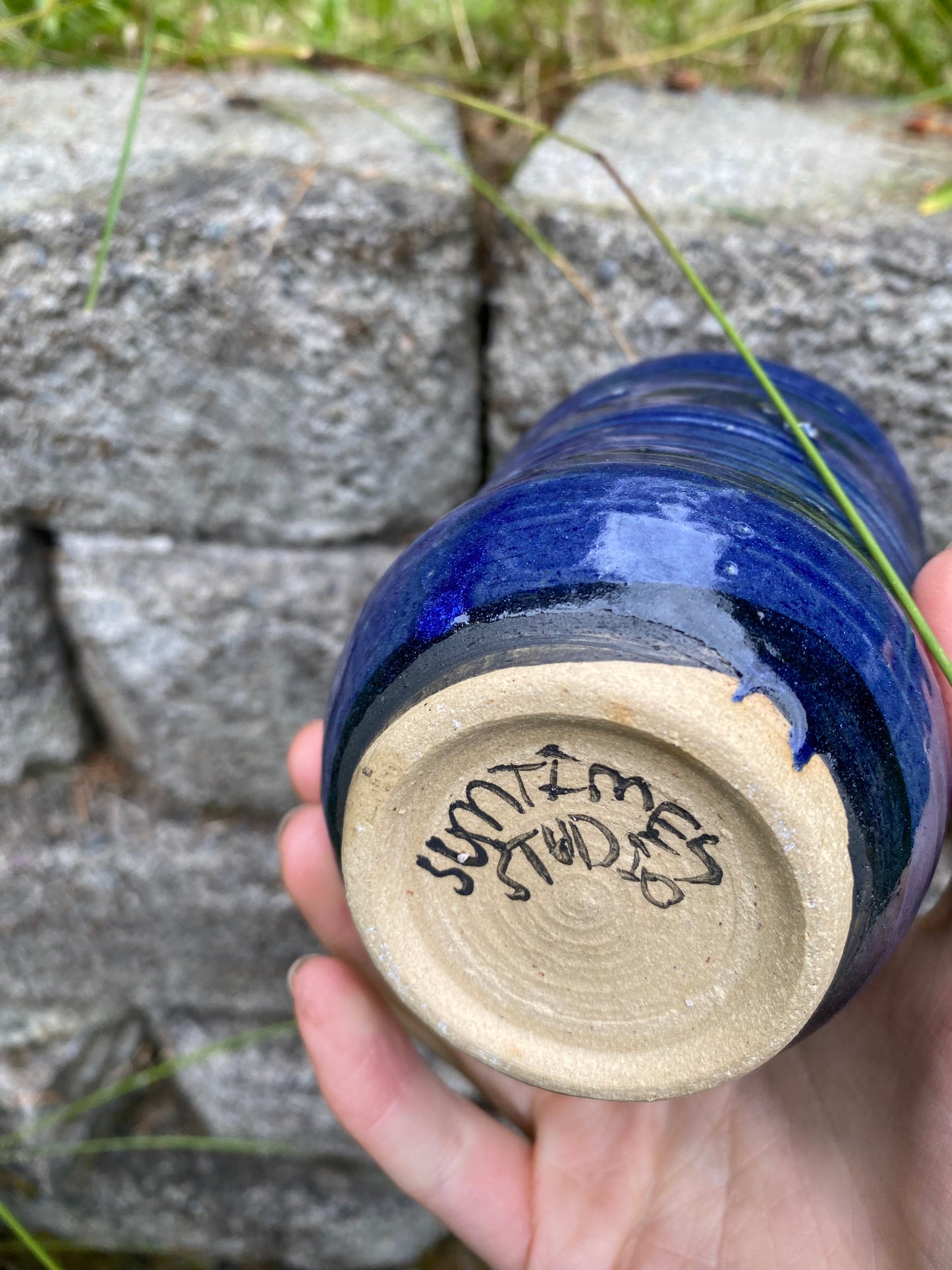 Blue tumbler with horizontal stripe