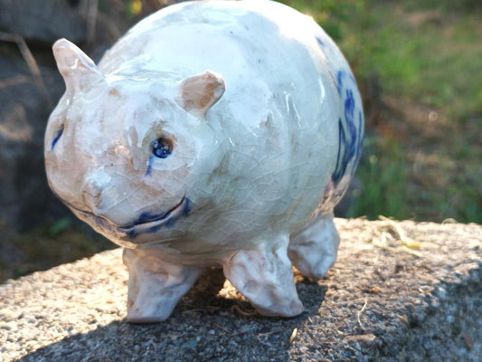 Beast piggy bank with blue fence