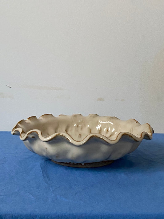 Yellow cream plate with ruffled edge