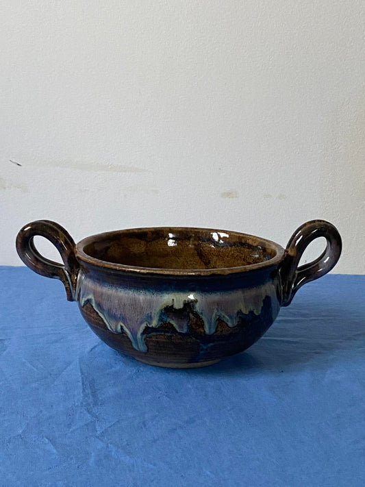 Black two handled bowl violet drips