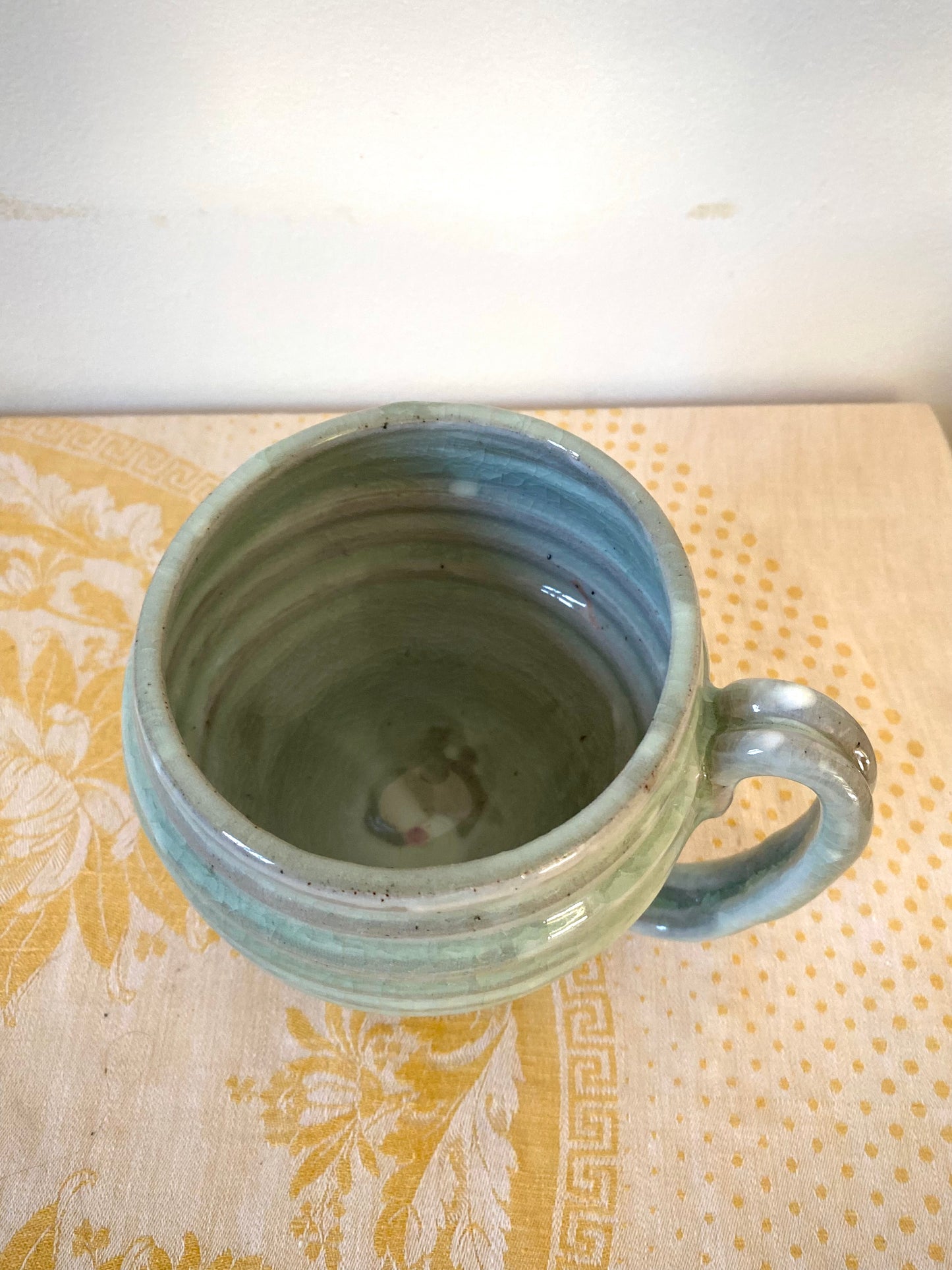 Light green mug with horizontal bands